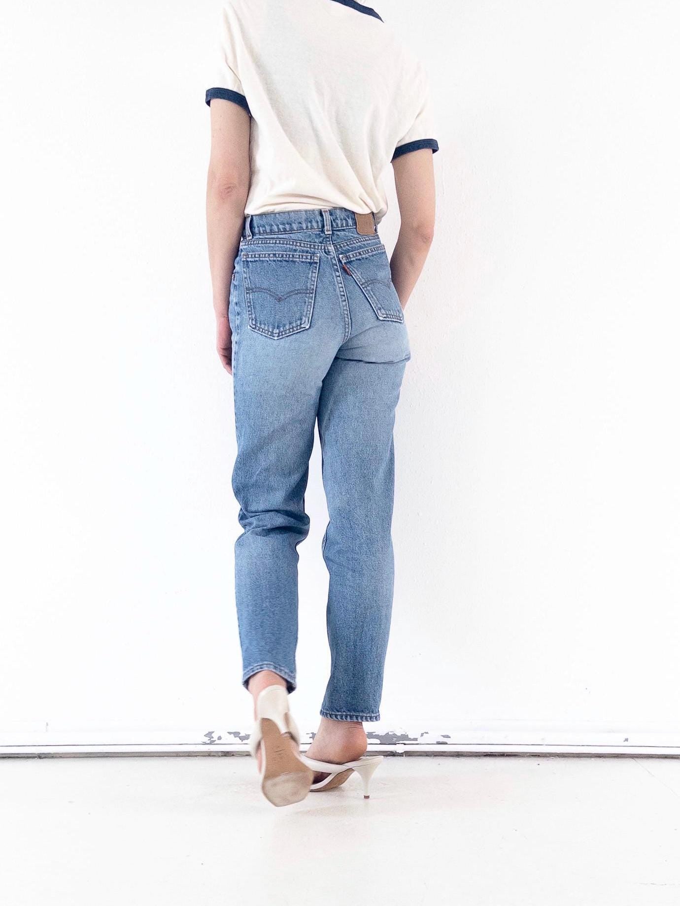 Vintage Levis 416 Jeans Damen W26 | 80s High Waist Denim | Made in Belgium | Orange Tab | Straight Leg | Light Distressed