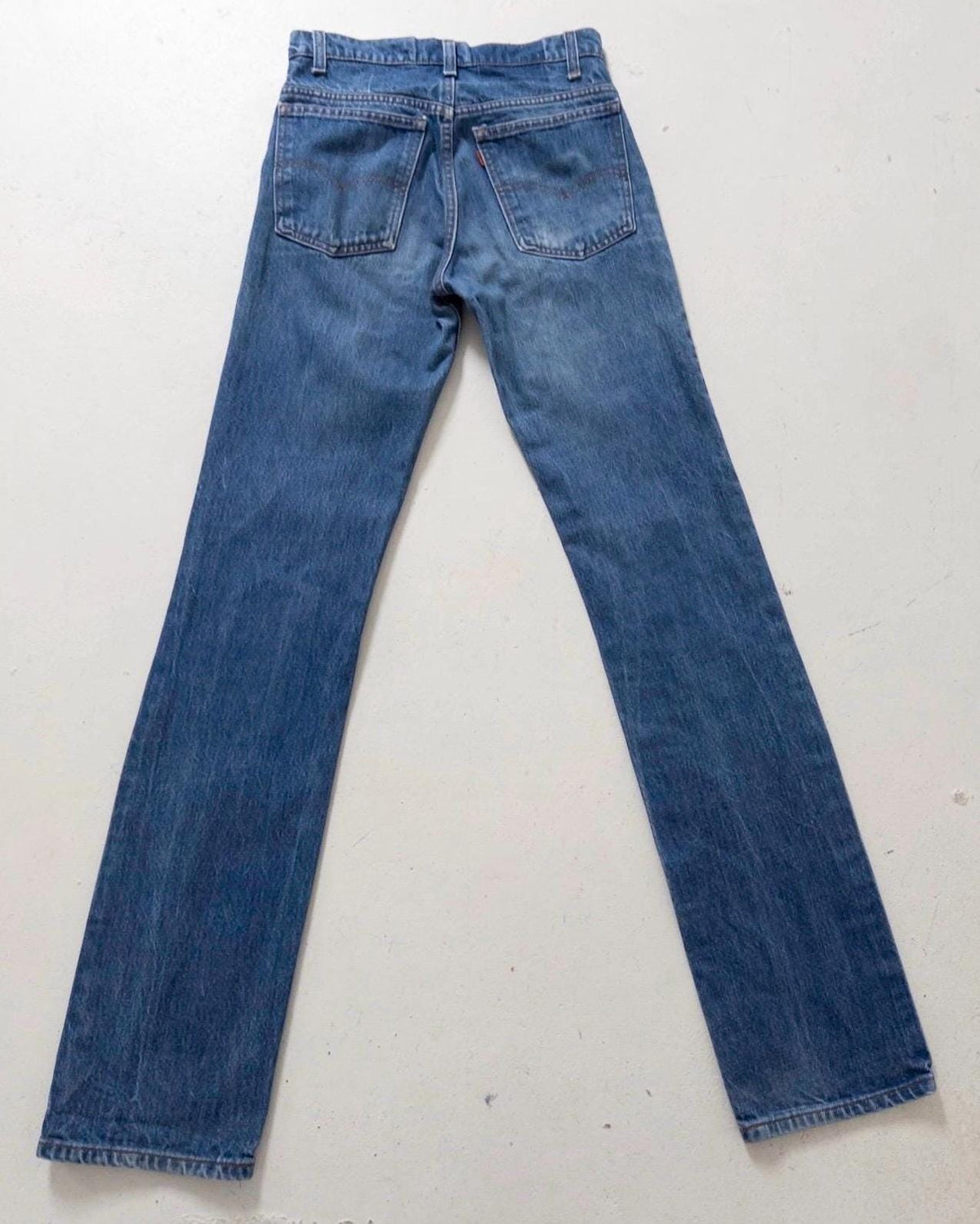 Levis 519 W26-27 L36 80s Vintage Orange Tab Denim Faded Mid Blue Cigarette Jeans Made in USA 1984