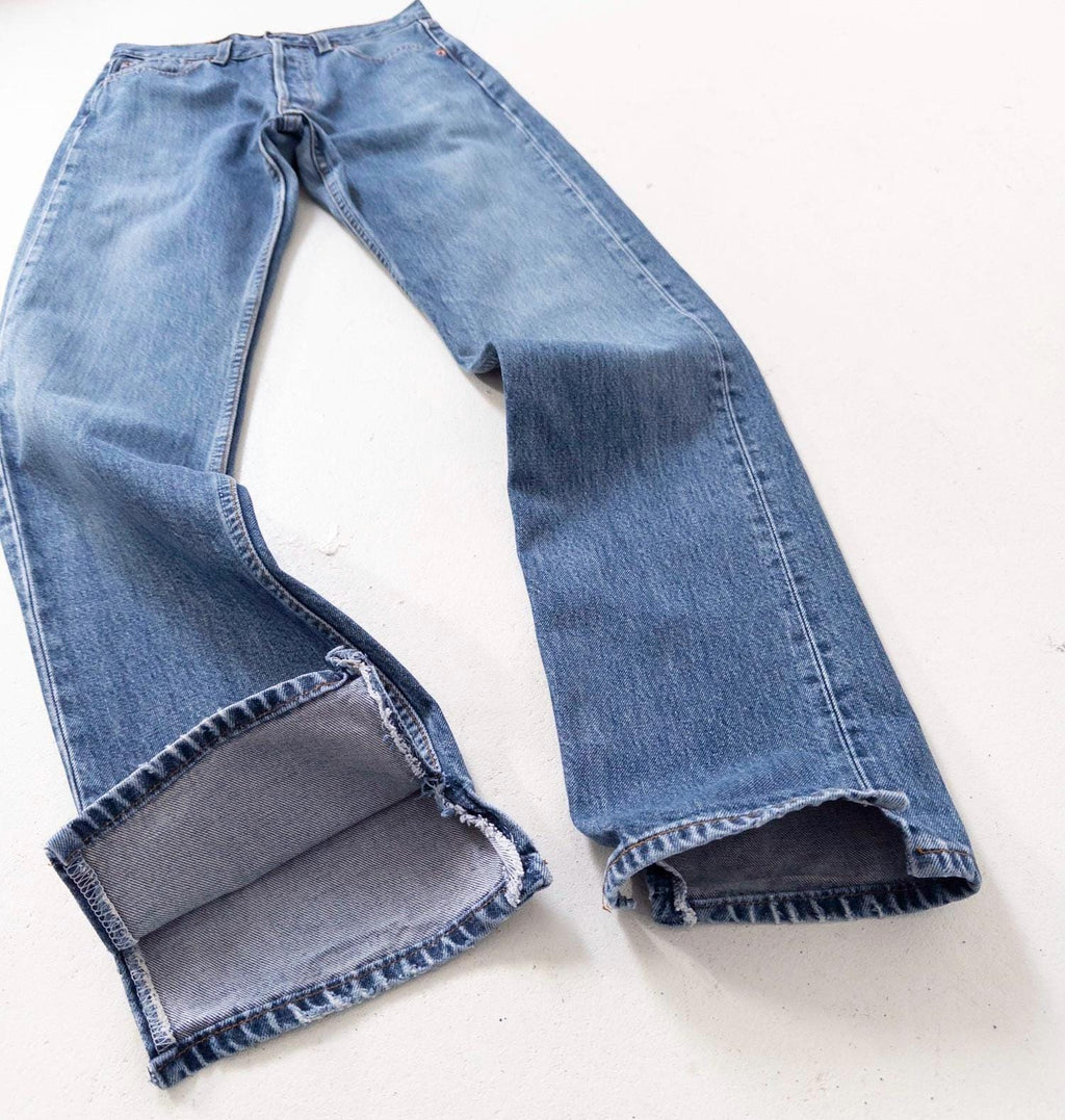 Levis 501 W25-26 L34 90s Vintage Faded Mid Blue Slit Hem Denim Made in Poland 1998